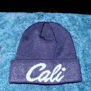 Navy blue “cali” beanie barely worn still looks new